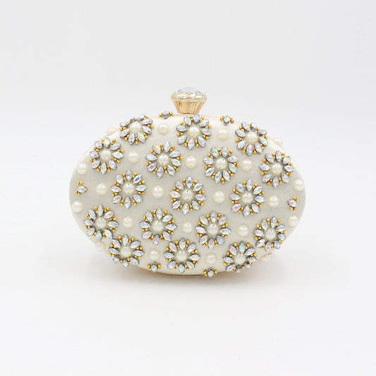 Round Egg Shaped Diamond Clutch