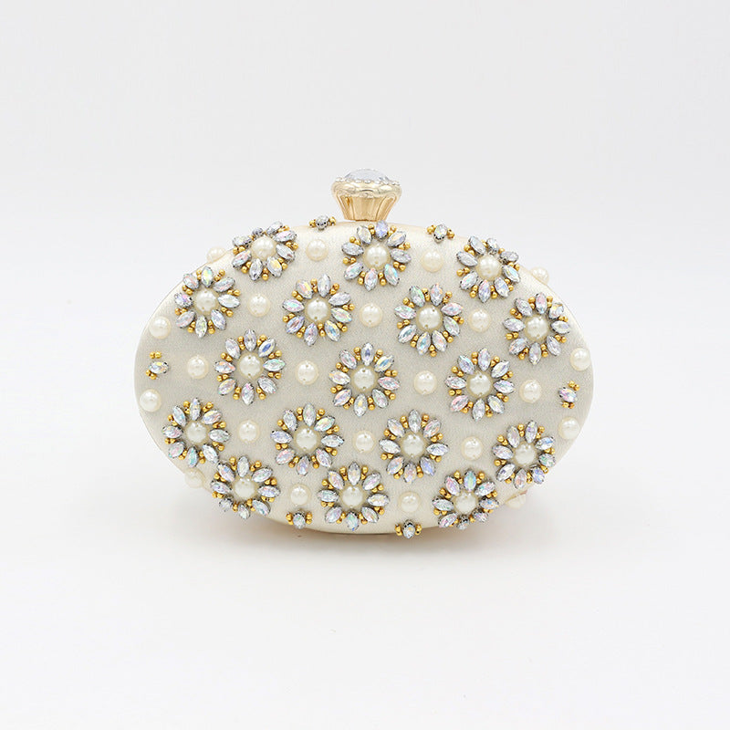 Round Egg Shaped Diamond Clutch