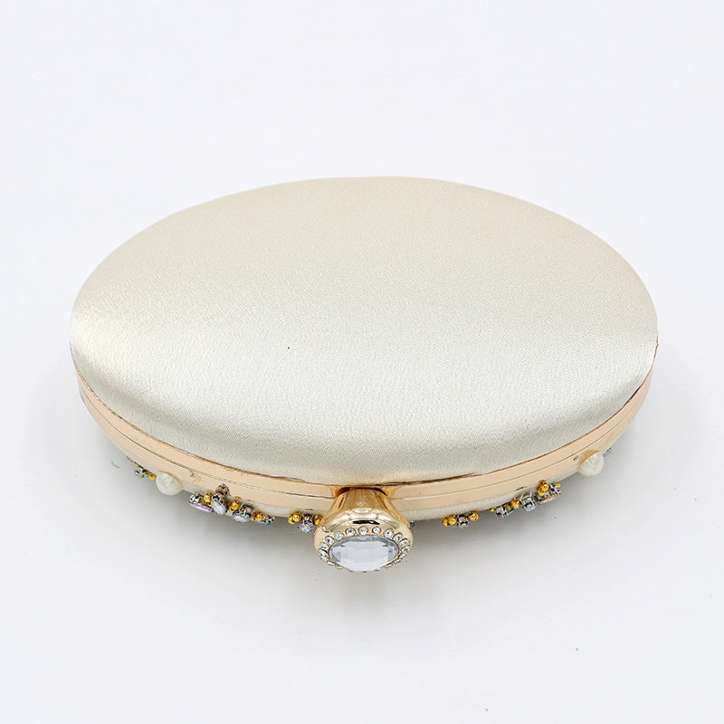 Round Egg Shaped Diamond Clutch