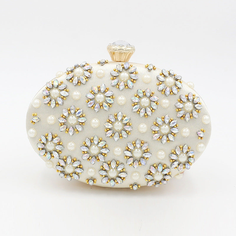 Round Egg Shaped Diamond Clutch