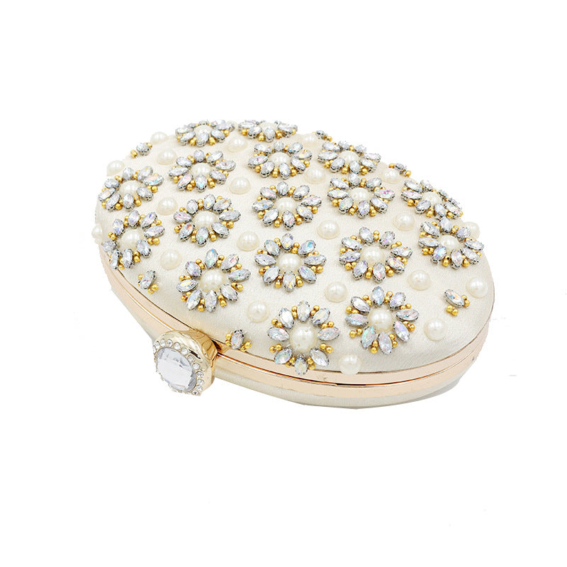 Round Egg Shaped Diamond Clutch